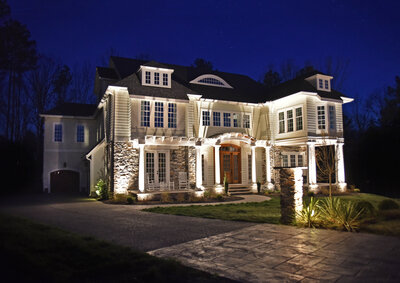 Gorgeous two-story home with beautiful outdoor lighting installation